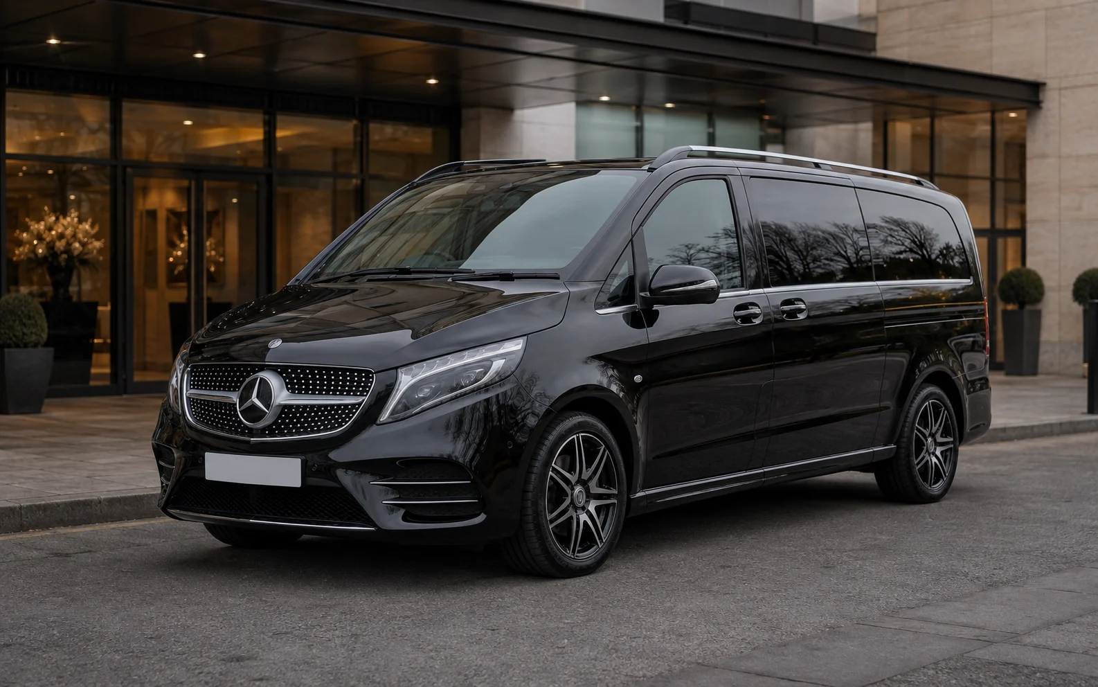 Front three-quarter view of Vectura's black Mercedes-Benz V-Class Extra Long